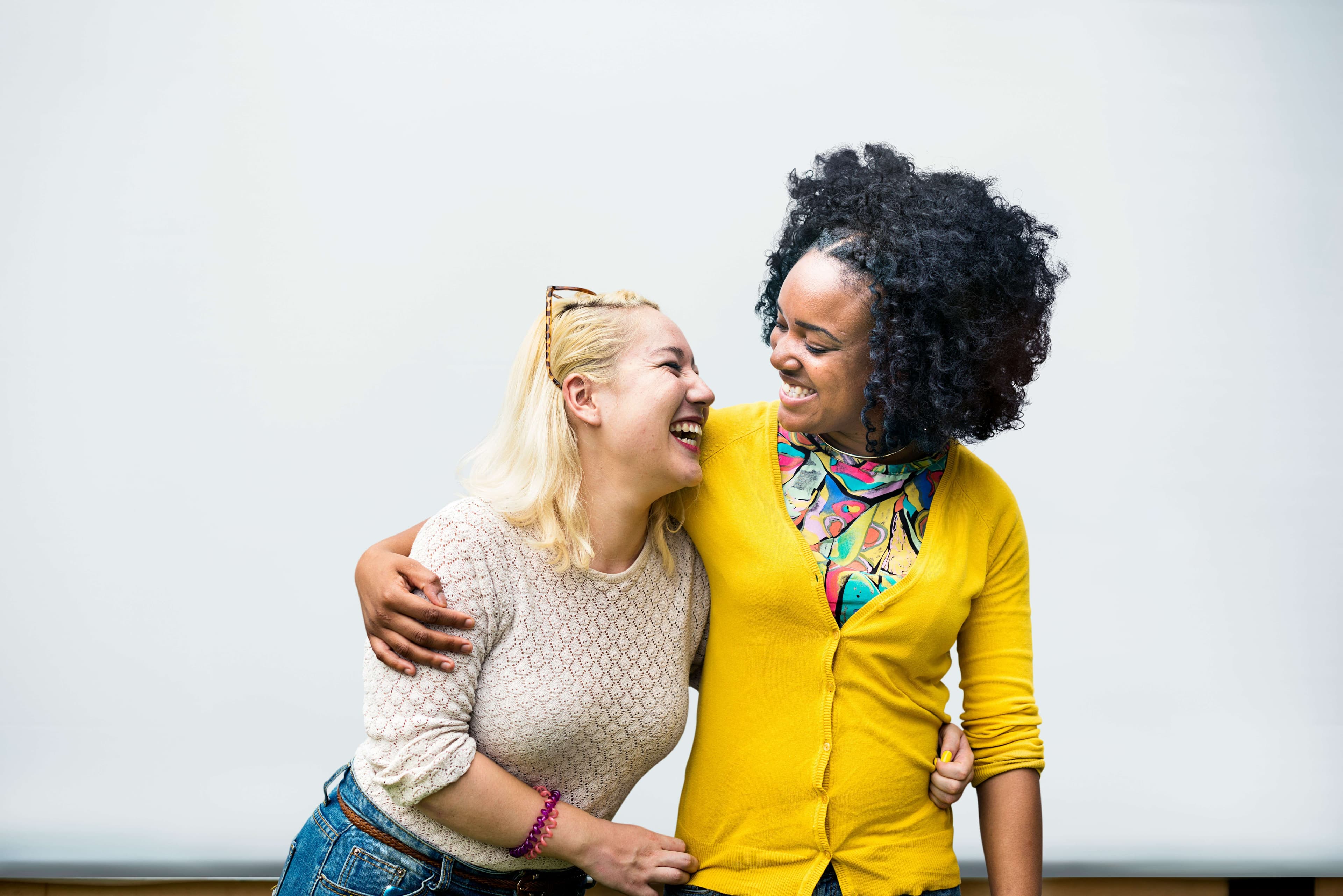 Two women hugging